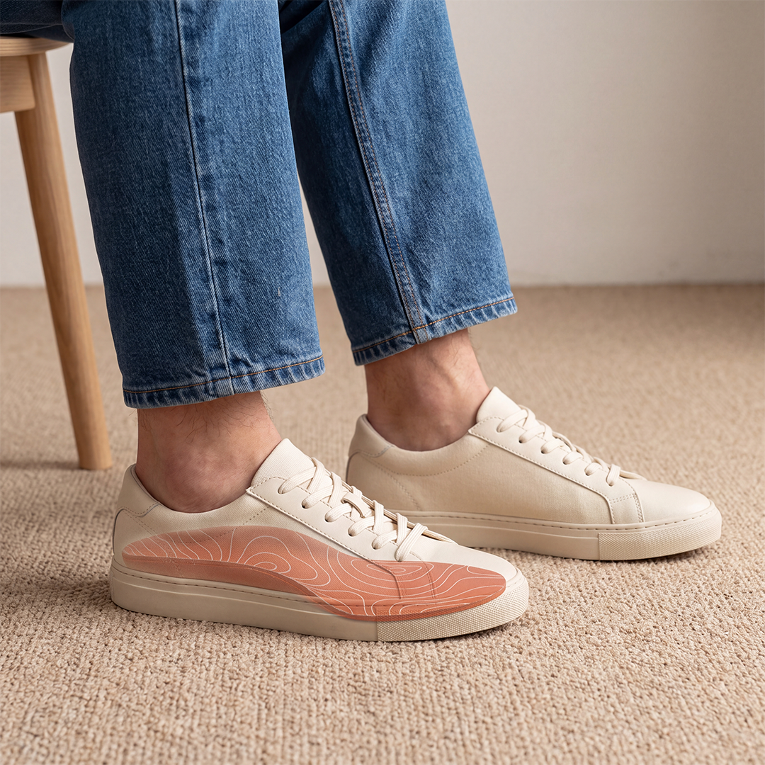 Walking around a living room to mold the orthotic under bodyweight